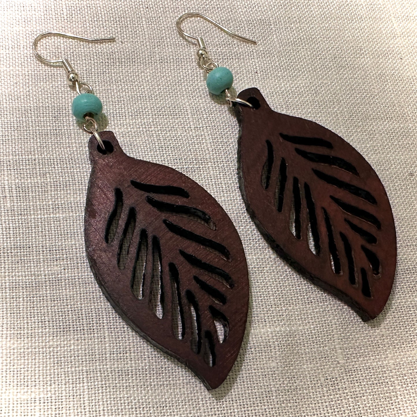 Handcrafted African Hardwood Leaf Earrings with Turquoise Beads